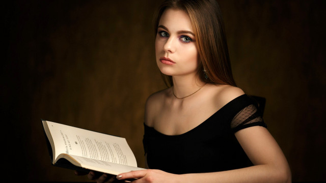 Woman black dress holding book #2 free wallpaper - medium preview image
