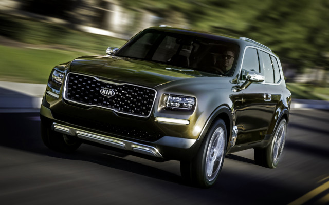 Green suv driving road forest free wallpaper - medium preview image
