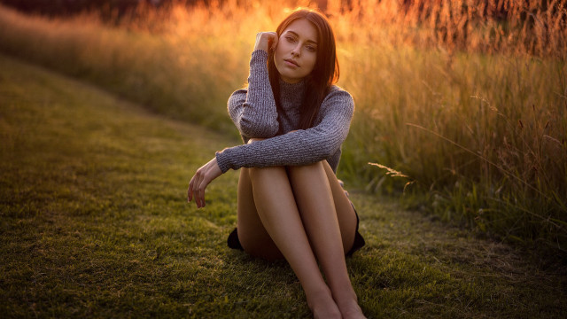 Woman sitting field sunset portrait free wallpaper - medium preview image