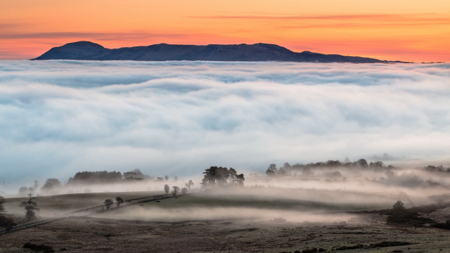 Mountain fog people trees sunset free wallpaper - medium preview image