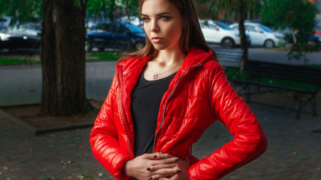 Woman red jacket park portrait free wallpaper - medium preview image