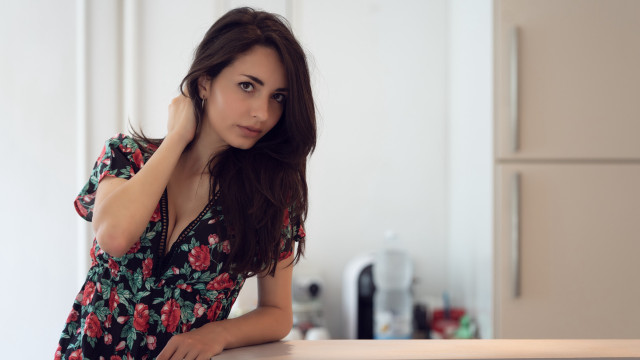 Woman kitchen knife floral portrait free wallpaper - medium preview image