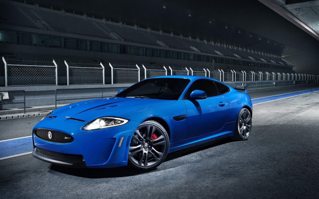 Blue sports car night stadium free wallpaper - medium preview image