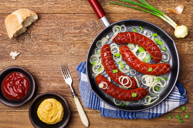 Sausages onions mustard wooden table free wallpaper - medium preview image