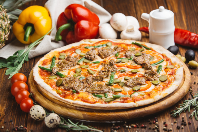 Pizza meat vegetables wooden table free wallpaper - medium preview image