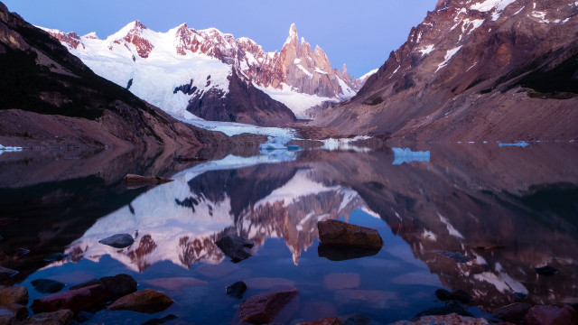 Mountain lake snow rocks dusk free wallpaper - medium preview image