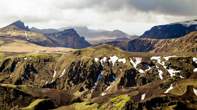 Mountain snow green cliffs cloudy free wallpaper - medium preview image