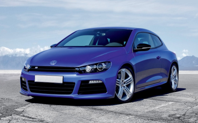 Blue car mountains clouds photorealism free wallpaper - medium preview image