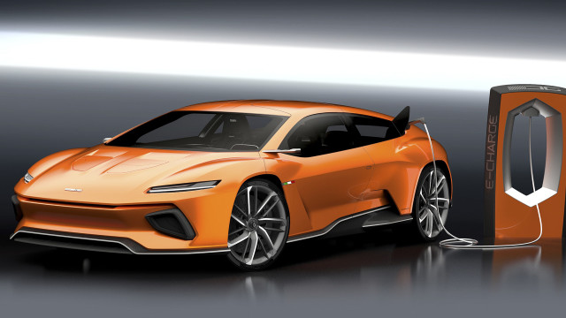 Futuristic orange car charging dark free wallpaper - medium preview image