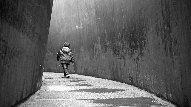 Person walking sidewalk wall sky free wallpaper - medium preview image