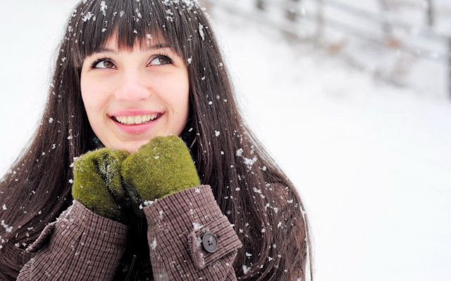 Woman smiling snow winter brownjacket free wallpaper - medium preview image