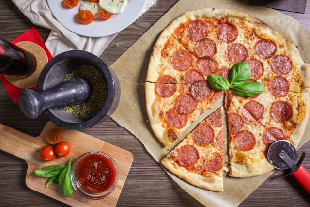 Pepperoni pizza slice missing table free wallpaper - medium preview image