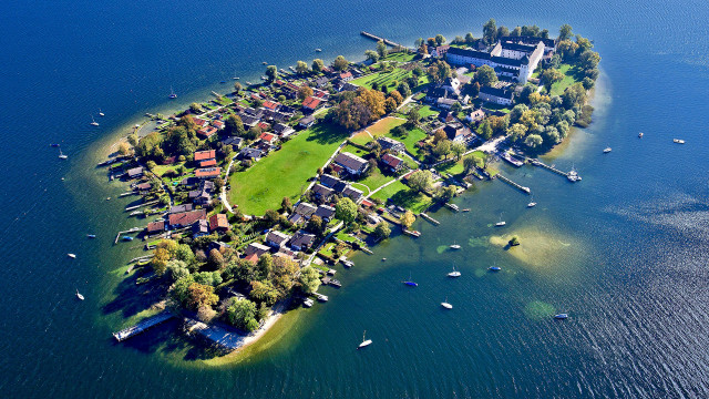 Small island houses boats night free wallpaper - medium preview image
