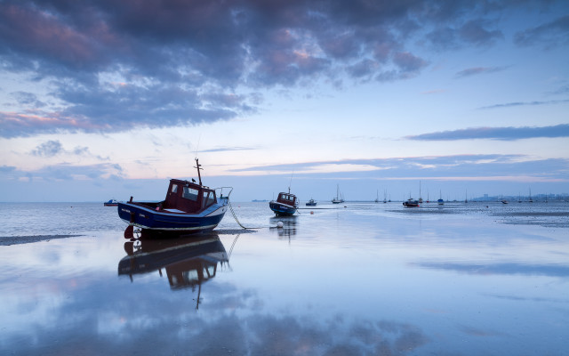 Boats beach water sky clouds free wallpaper - medium preview image