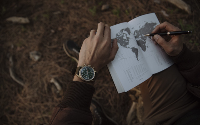 Person holding pen book writing free wallpaper - medium preview image