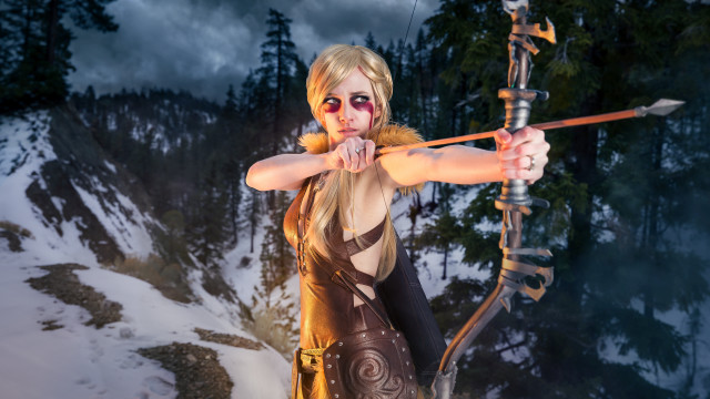 Woman archer snowy mountains portrait free wallpaper - medium preview image