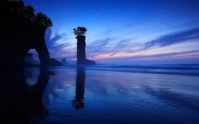 Tall tower beach ocean sunset free wallpaper - medium preview image