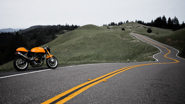 Motorcycle hill road trees mountain free wallpaper - medium preview image