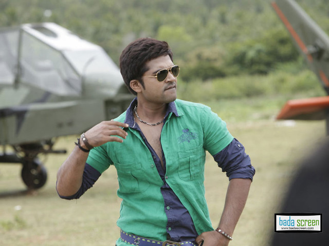 Man green shirt airplane field free wallpaper - medium preview image