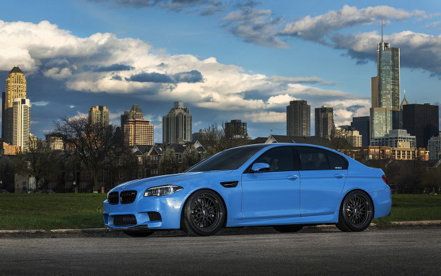 Blue car city skyline clouds free wallpaper - medium preview image