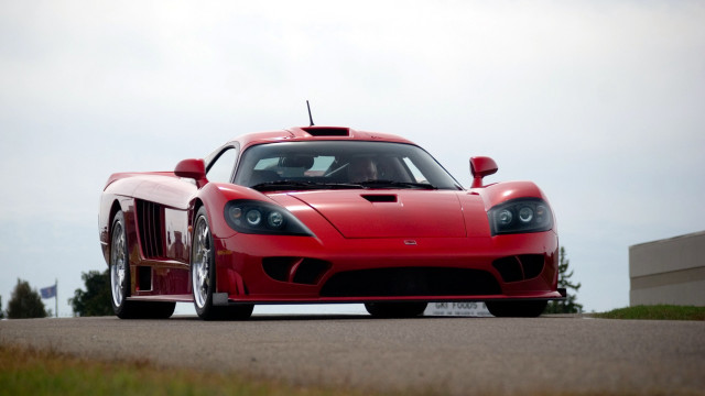 Red sports car road building #3 free wallpaper - medium preview image