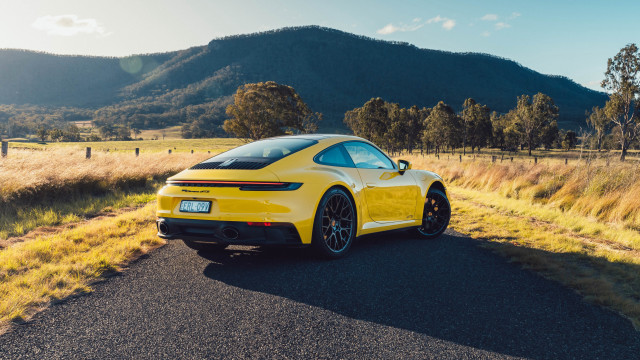 Yellow sports car mountain road free wallpaper - medium preview image