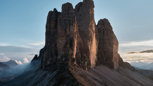 Mountain rock formation clouds beach free wallpaper - medium preview image
