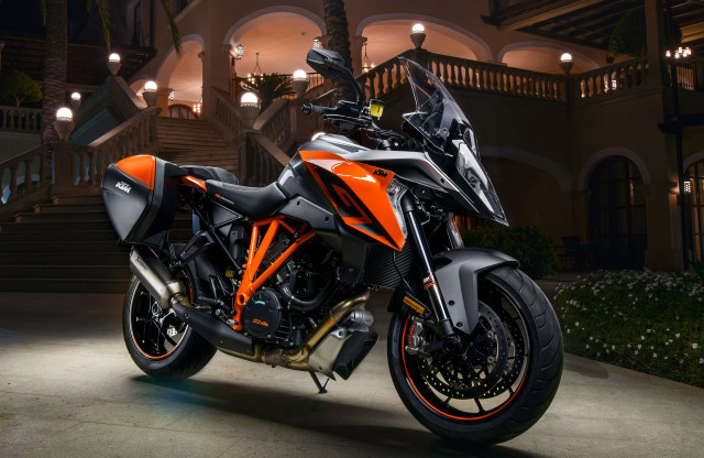 Motorcycle building night lights staircase free wallpaper - medium preview image