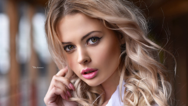Blonde woman white shirt hand free wallpaper - medium preview image