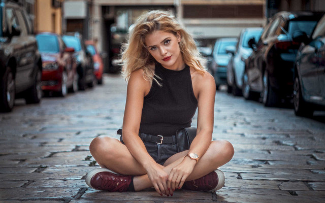 Woman sitting black dress boots free wallpaper - medium preview image