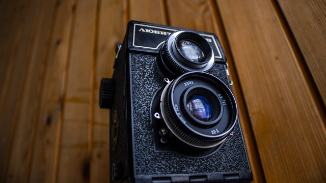 Camera lens wooden surface floor free wallpaper - medium preview image