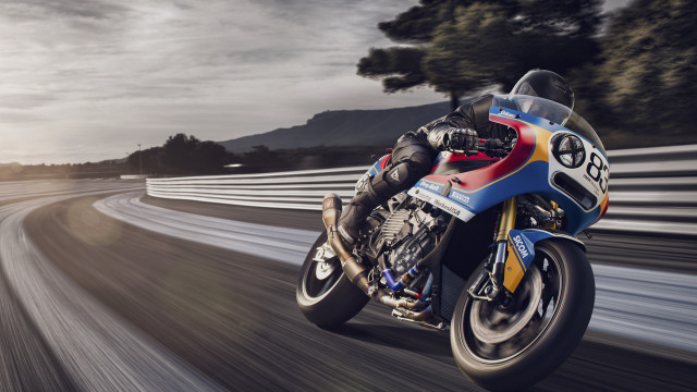 Motorcycle driving cloudy sky trees free wallpaper - medium preview image
