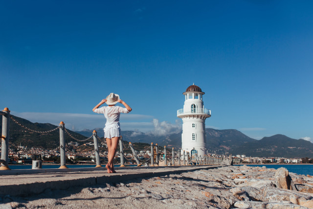 Woman white dress hat pier free wallpaper - medium preview image