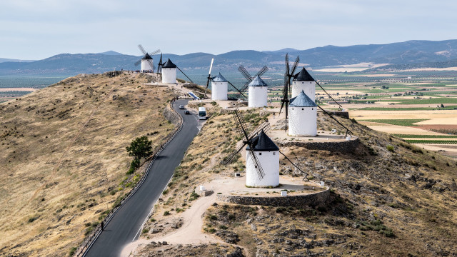 Road windmills hills mountains sunset free wallpaper - medium preview image