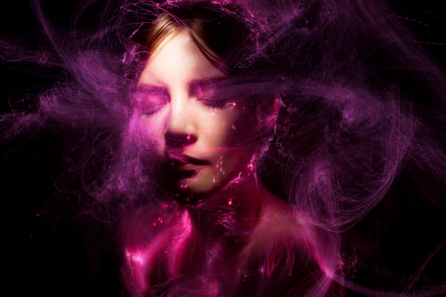 Woman blowing hair pink smoke free wallpaper - medium preview image