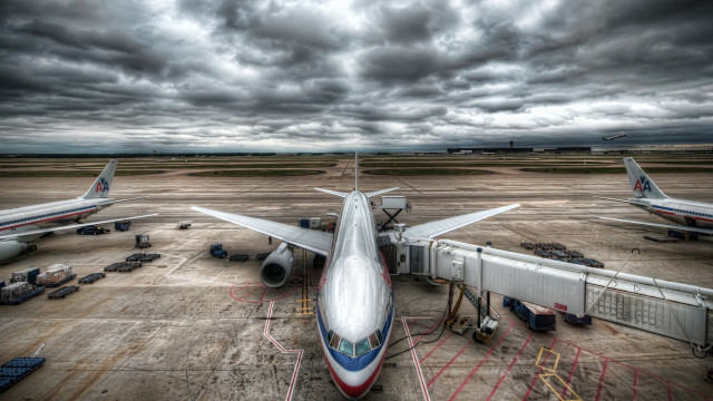 Large jetliner cloudy tarmac photorealism free wallpaper - medium preview image