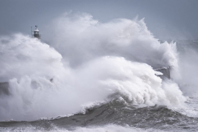 Lighthouse wave ocean cloudy stormy free wallpaper - medium preview image