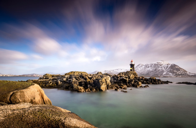 Lighthouse rocky shore mountain cloudy free wallpaper - medium preview image