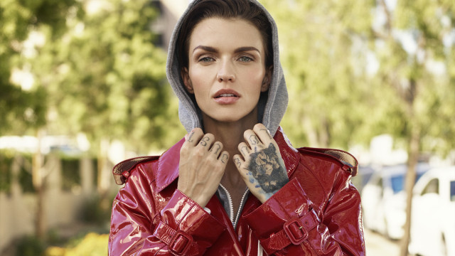 Surprised woman redjacket hands up free wallpaper - medium preview image