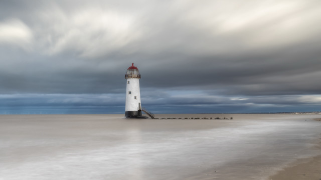 Lighthouse beach cloudy sky water free wallpaper - medium preview image