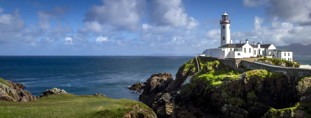 Lighthouse cliff ocean clouds grassy free wallpaper - medium preview image