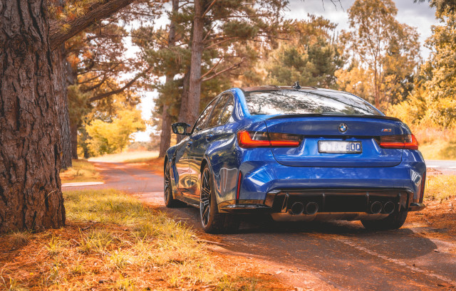 Blue car autumn leaves fire free wallpaper - medium preview image