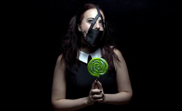 Woman gasmask lollipop transgressive portrait free wallpaper - medium preview image
