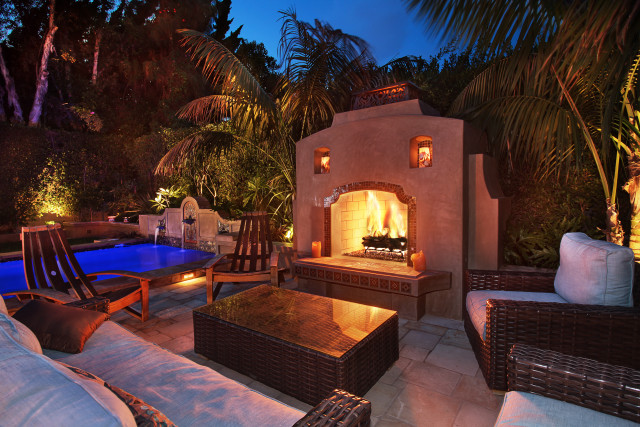 Patio fireplace seating pool night free wallpaper - medium preview image
