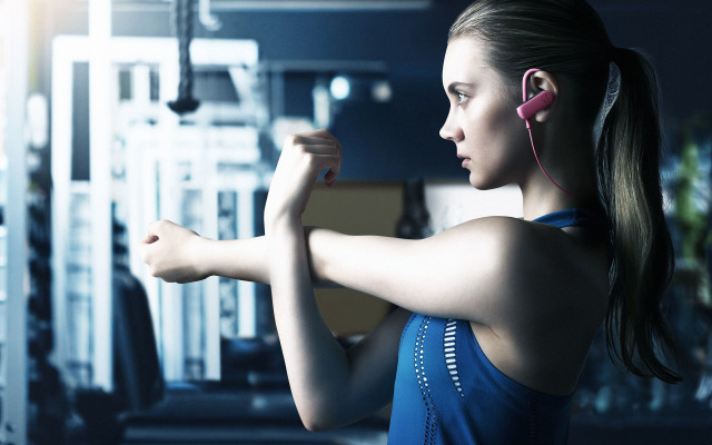 Woman gym earphones arm muscles free wallpaper - medium preview image