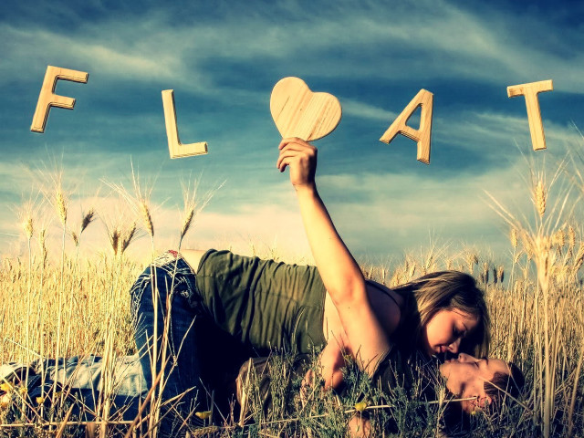 Woman laying field float heart free wallpaper - medium preview image