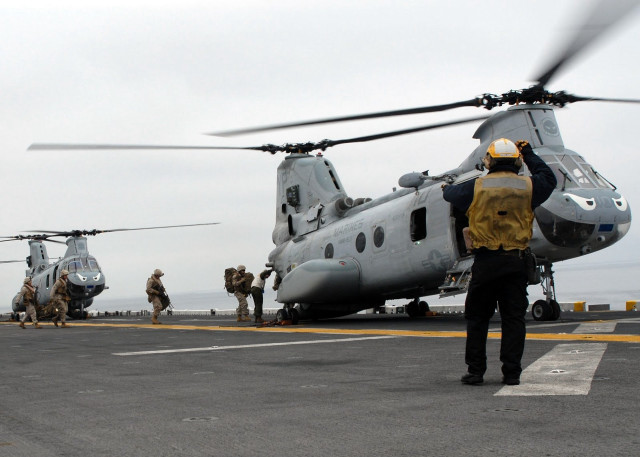 Men helicopter airport runway group free wallpaper - medium preview image