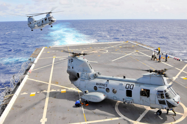 Helicopter flying over ship ocean free wallpaper - medium preview image
