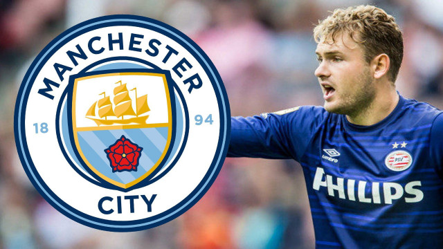 Man holding soccer ball city free wallpaper - medium preview image