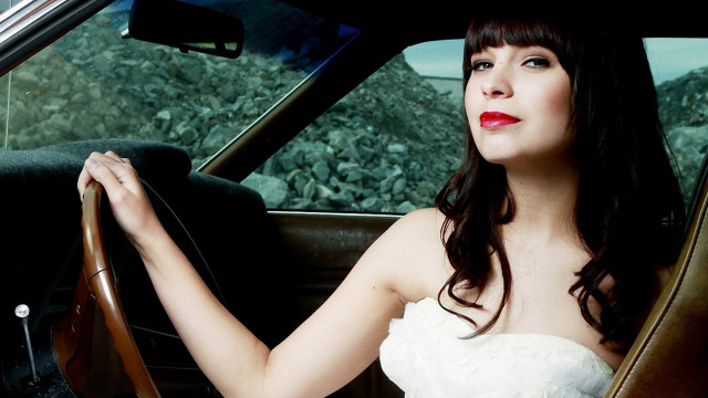 Woman white dress car steering free wallpaper - medium preview image